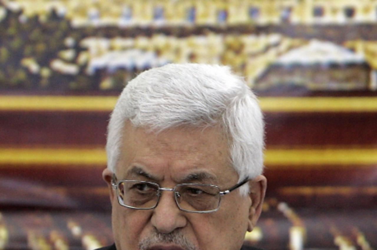 'Palestinian president Mahmud Abbas attends a meeting of the Palestine Liberation Organisation (PLO) executive committee in the West Bank city of Ramallah on May 8, 2010. A divided PLO met to decide w