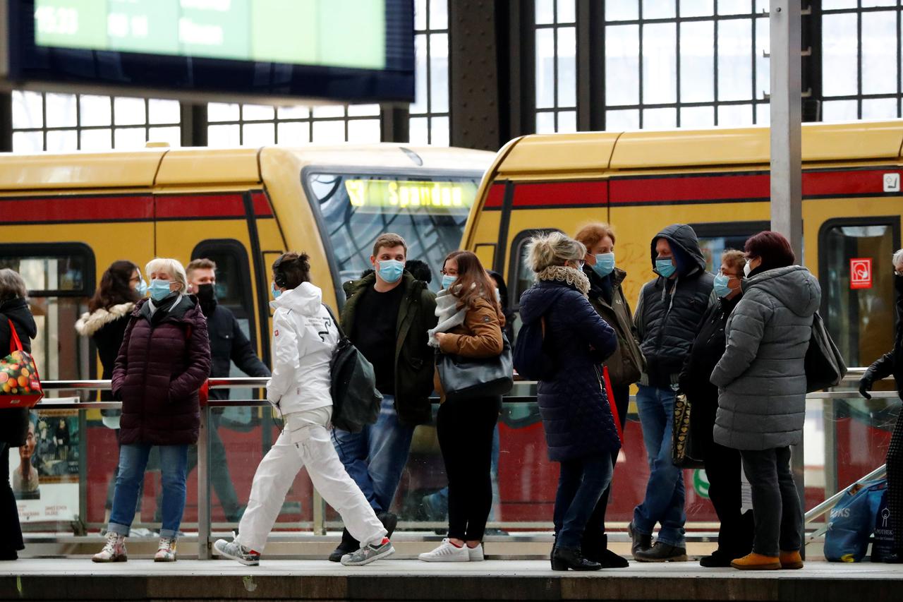Passengers wear face masks at Friedrichstrasse station during COVID-19 lockdown in Berlin