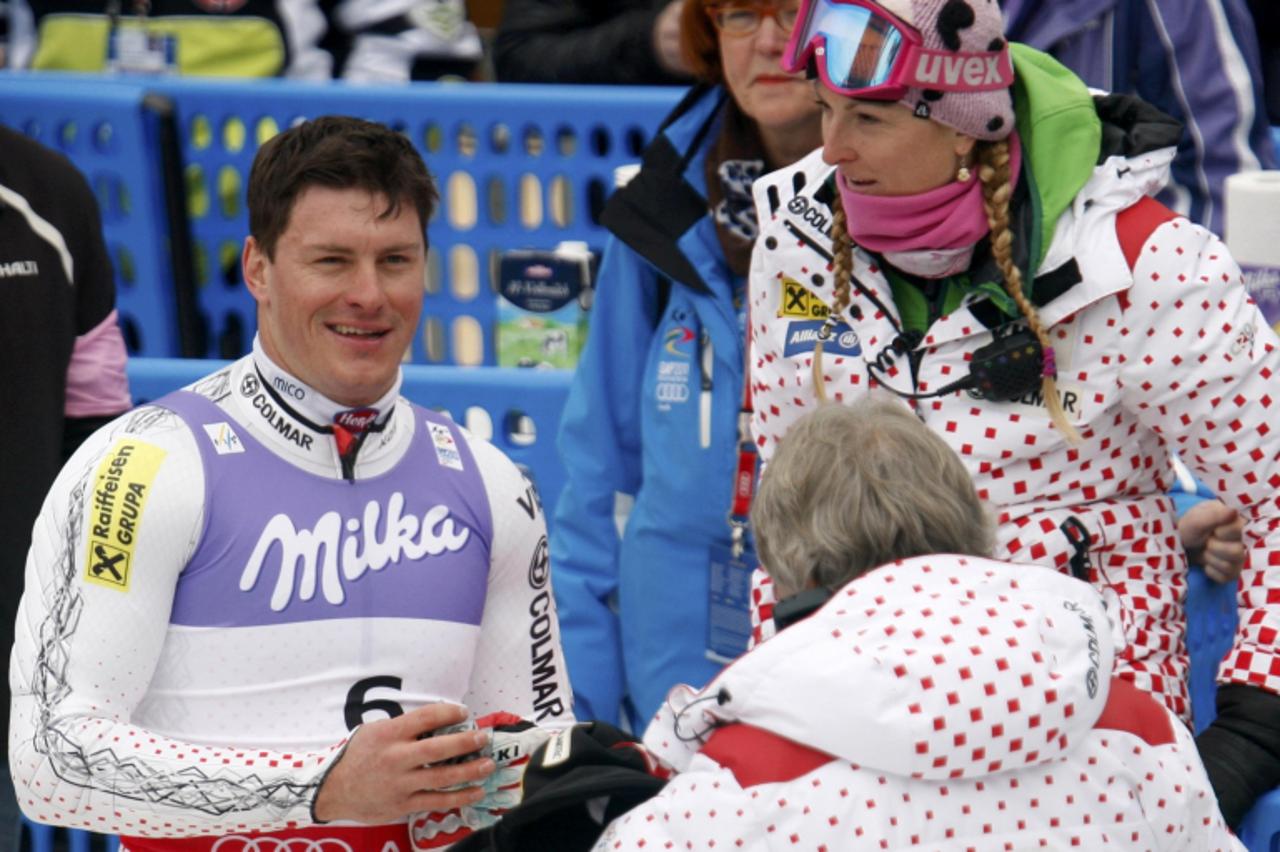 \'Ivica Kostelic (L) of Croatia talks to his sister Janica (R) after competing in men\'s slalom race at the Alpine Skiing World Championships in Garmisch-Partenkirchen February 20, 2011.              