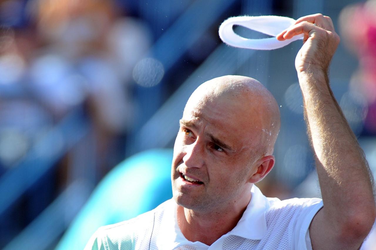 'Ivan Ljubicic of Croatia celebrates after his victory against Juan Monaco of Argentina during the BNP Paribas Open on March 18, 2010 at the Indian Wells Tennis Garden in Indian Wells, California. Lju