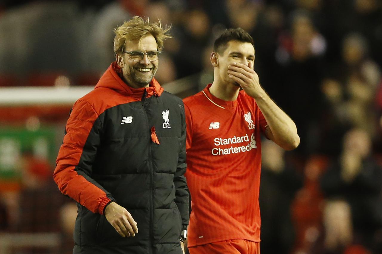 Football Soccer - Liverpool v Swansea City - Barclays Premier League - Anfield - 29/11/15 Liverpool manager Juergen Klopp and Dejan Lovren celebrate at the end of the match Action Images via Reuters / Carl Recine Livepic EDITORIAL USE ONLY. No use with un