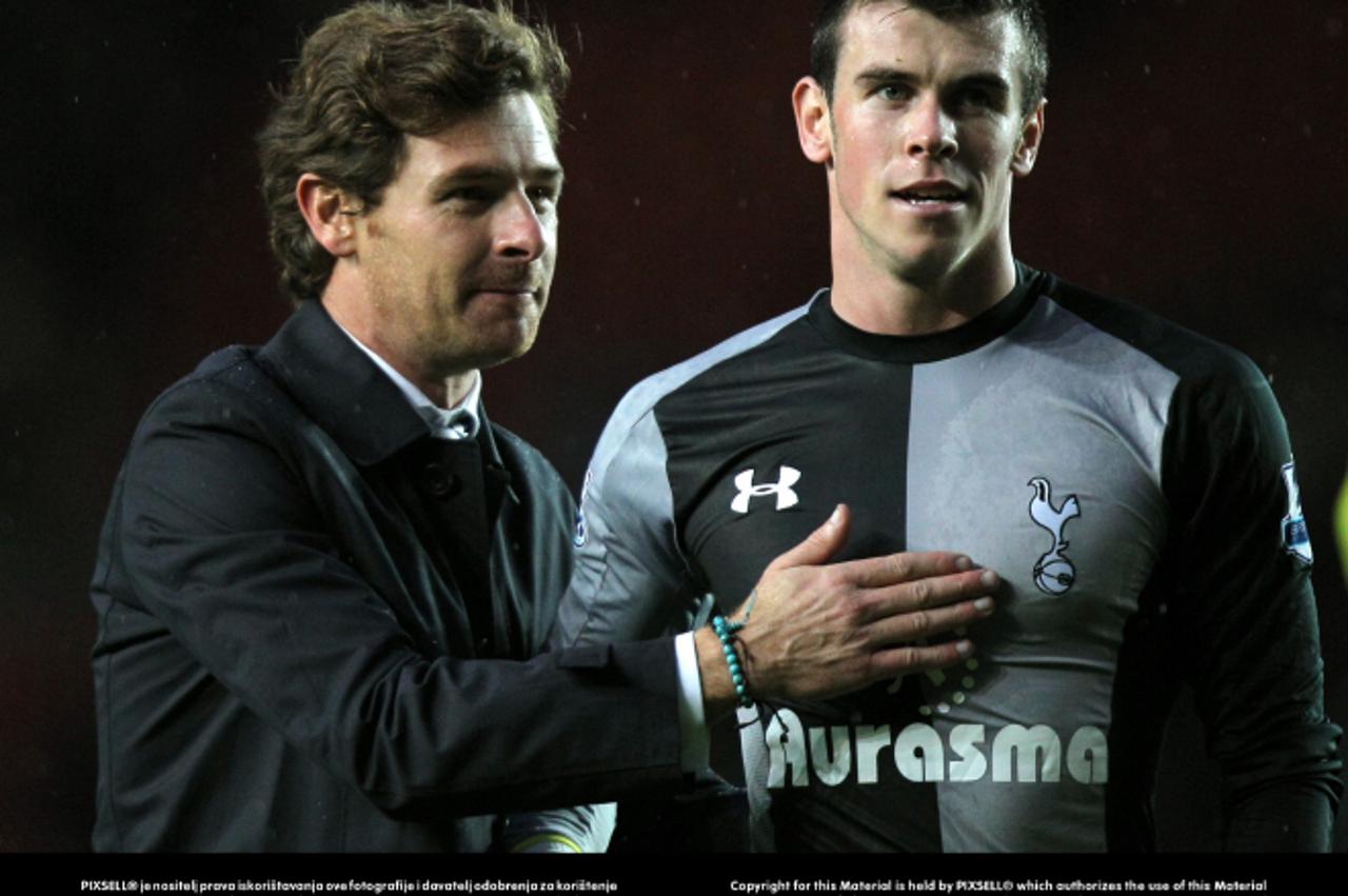 'Tottenham Hotspur's manager Andre Villas Boas celebrates with goalscorer Gareth Bale at the end of the match during the Barclays Premier League match at St Mary's Stadium, Southampton.Photo: Press 