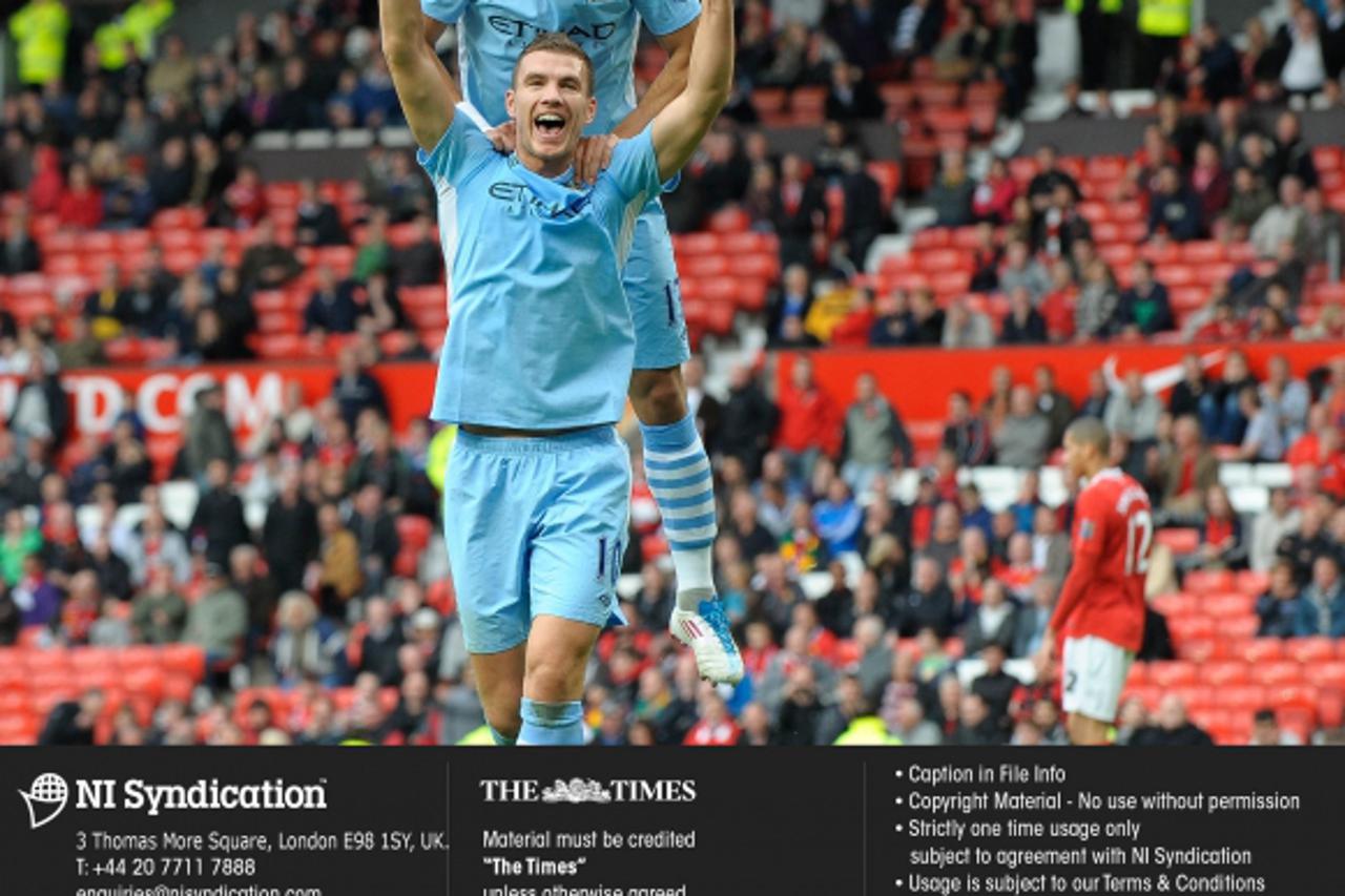 '23.10.11. Manchester United v Manchester City. Edin Dzeko scores City\'s 6th goal. Credit: The Times Online rights must be cleared by N.I.Syndication Photo: NI Syndication/PIXSELL'