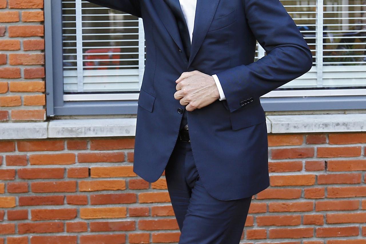 Dutch Prime Minister Mark Rutte of the VVD party waves after voting in the general election in The Hague, Netherlands, March 15, 2017.     REUTERS/Michael Kooren