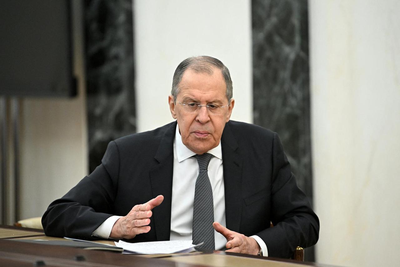 Russian Foreign Minister Sergei Lavrov attends a meeting with Russian President Vladimir Putin in Moscow