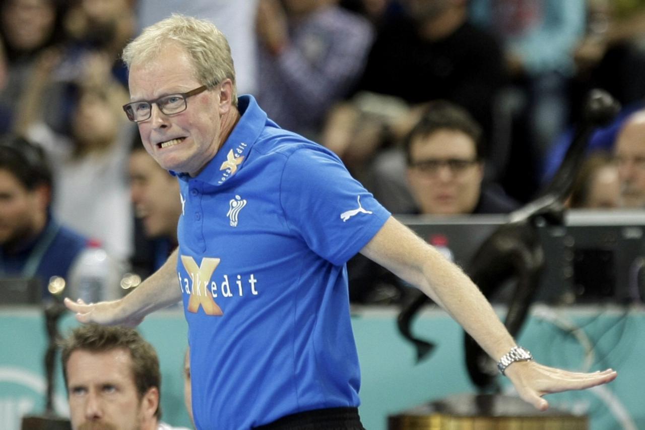 'Denmark\'s coach Ulrik Wilbek reacts during their Men\'s Handball World Championship final match against Spain at the Palau Sant Jordi arena in Barcelona January 27, 2013.  REUTERS/Gustau Nacarino (S