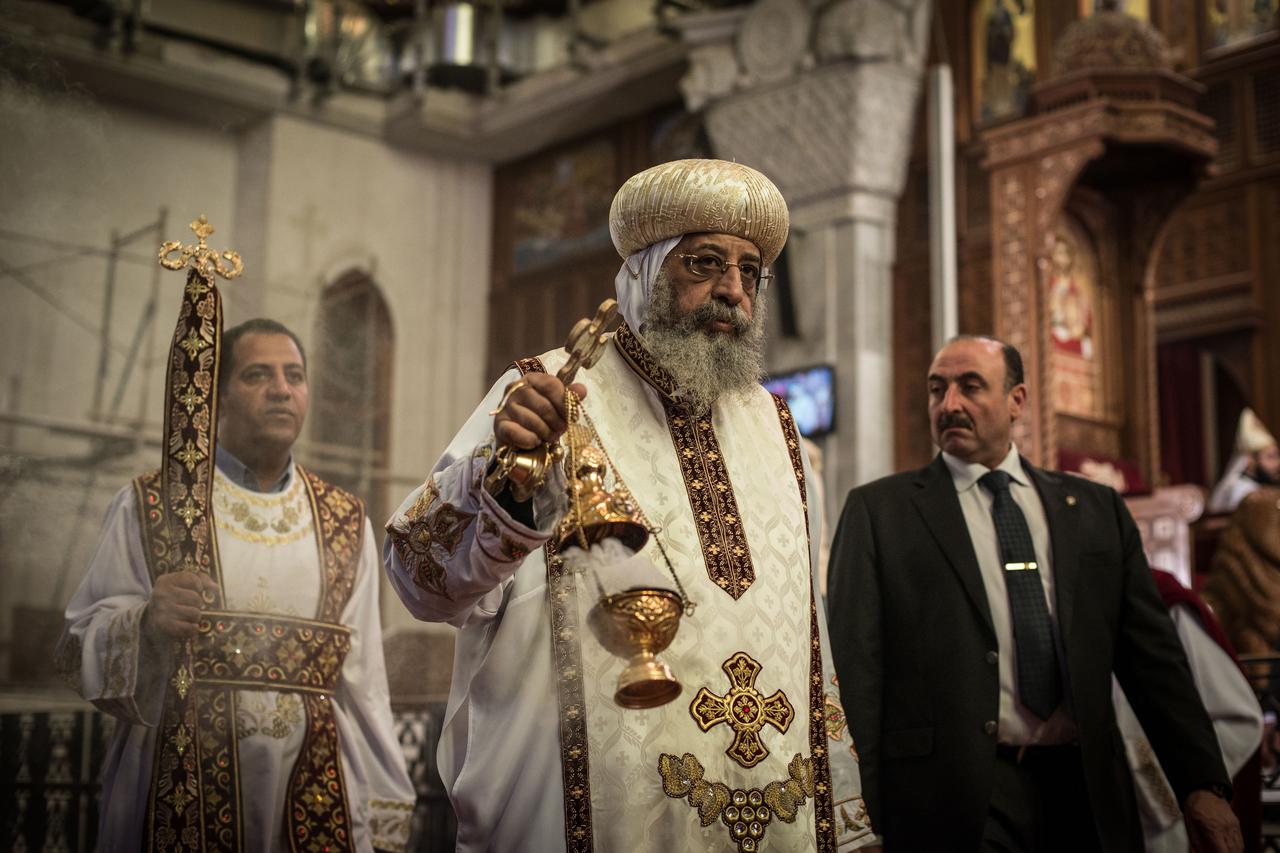 EGYPT-CAIRO-COPTIC-MASS(150217)-- CAIRO, Feb.17, 2015(Xinhua) -- Egyptian Coptic Pope Tawadros II (C) holds a mass for 21 Egyptian Coptic Christians purportedly murdered by Islamic State (IS) group militants in Libya, at St. Mark Cathedral, in Cairo, Egyp