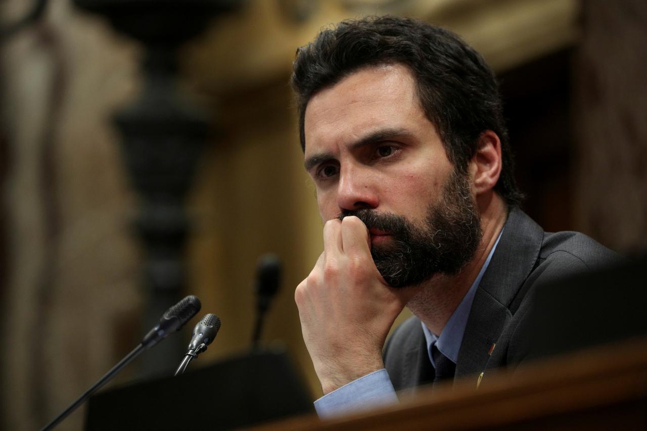 FILE PHOTO: Catalan parliament speaker Roger Torrent looks on during a debate in the regional parliament in Barcelona