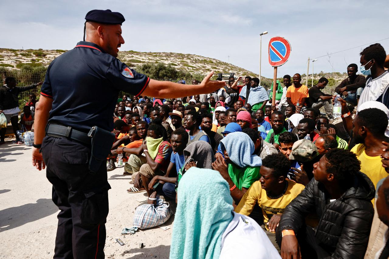 FILE PHOTO: Migrants in Lampedusa