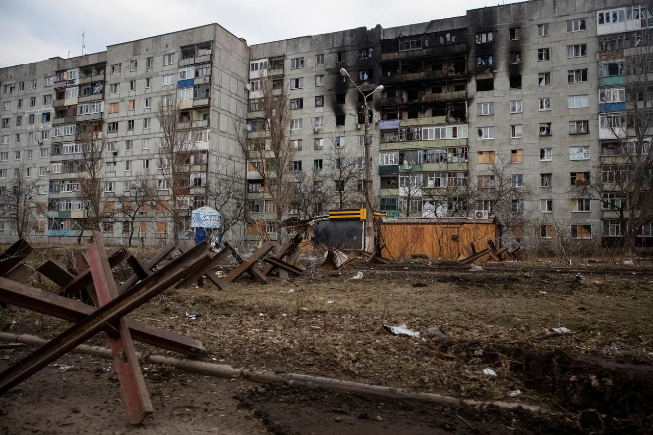 FILE PHOTO: A general view shows an empty street and buildings damaged by a Russian military strike in Bakhmut
