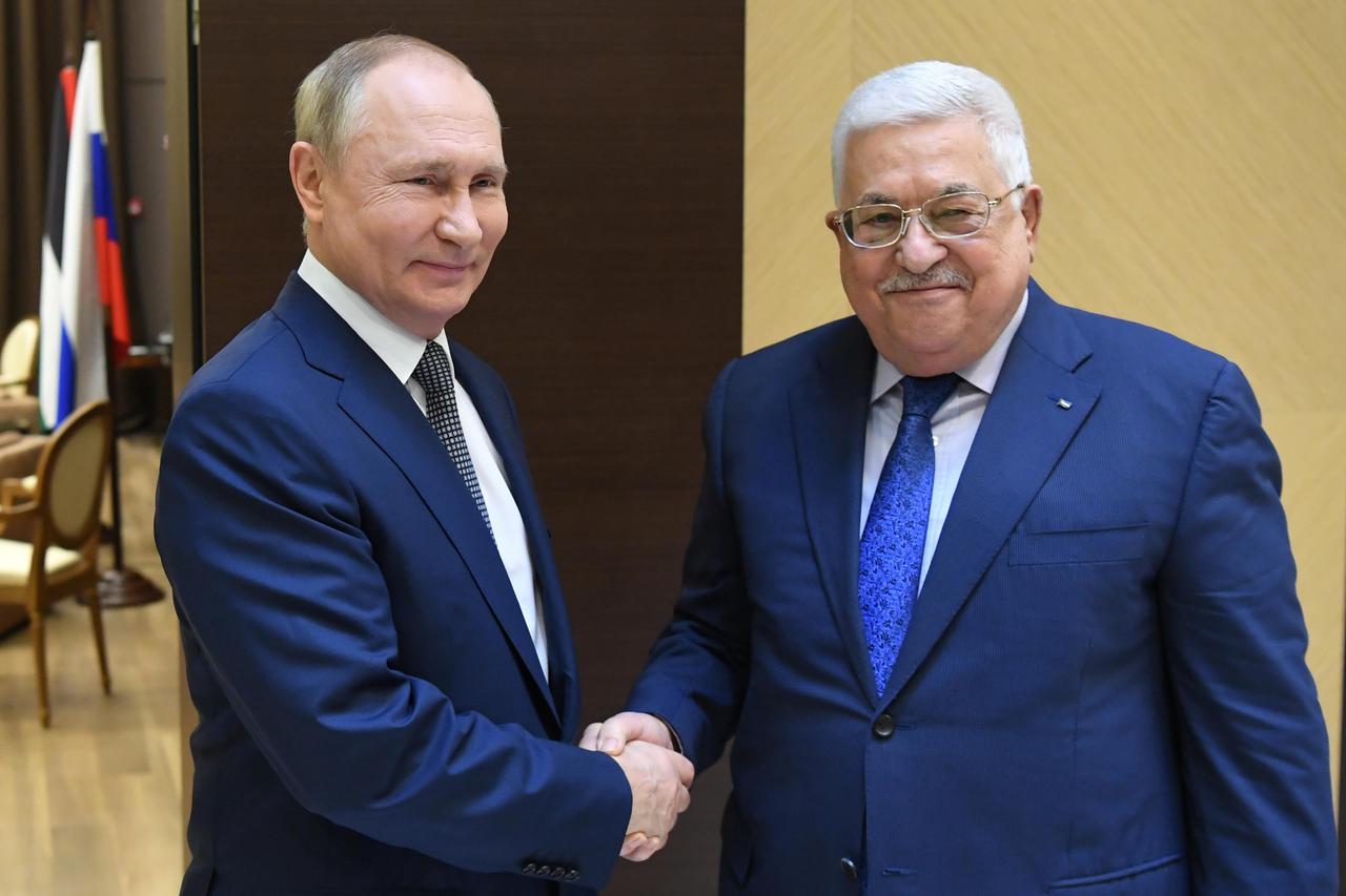 Russian President Vladimir Putin meets with Palestinian President Mahmoud Abbas in Sochi