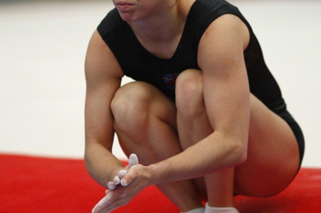 'Britain\'s Beth Tweddle attends a team training session before the World Gymnastic Championships at the O2 Arena in London October 10, 2009.      REUTERS/ Eddie Keogh (BRITAIN SPORT GYMNASTICS)'
