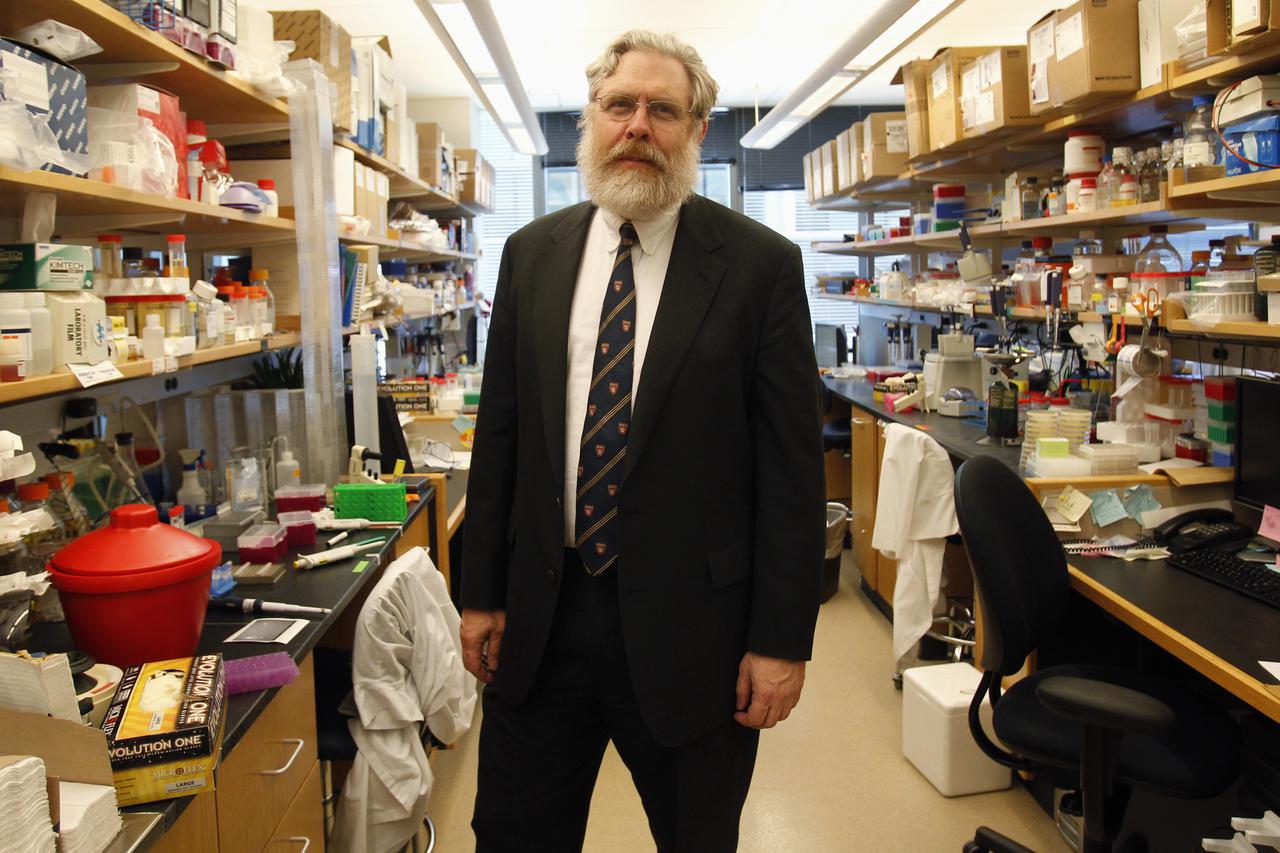 Harvard geneticist George Church poses for a portrait inside his lab at Harvard Medical School in Boston, Massachusetts January 23, 2013. After spending the weekend reading blog posts claiming that he was seeking an 