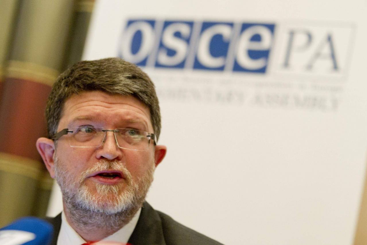 'OSCE election observer Tonino Picula speaks during a news conference presenting his mission\'s assessment after monitoring Russia\'s presidential election during a news conference in Moscow, March 5,
