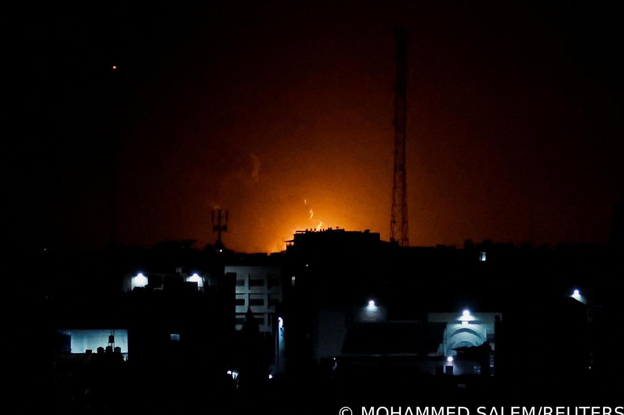 Smoke and flames rise during Israeli airstrikes in Gaza City