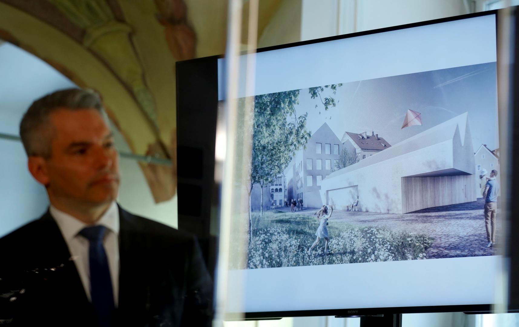 Austria presents redesign plan for house Hitler was born in, in Vienna Austrian Interior Minister Karl Nehammer presents the plan chosen for an architectural redesign of the house Adolf Hitler was born in during a news conference in Vienna, Austria June 2, 2020.  REUTERS/Leonhard Foeger LEONHARD FOEGER