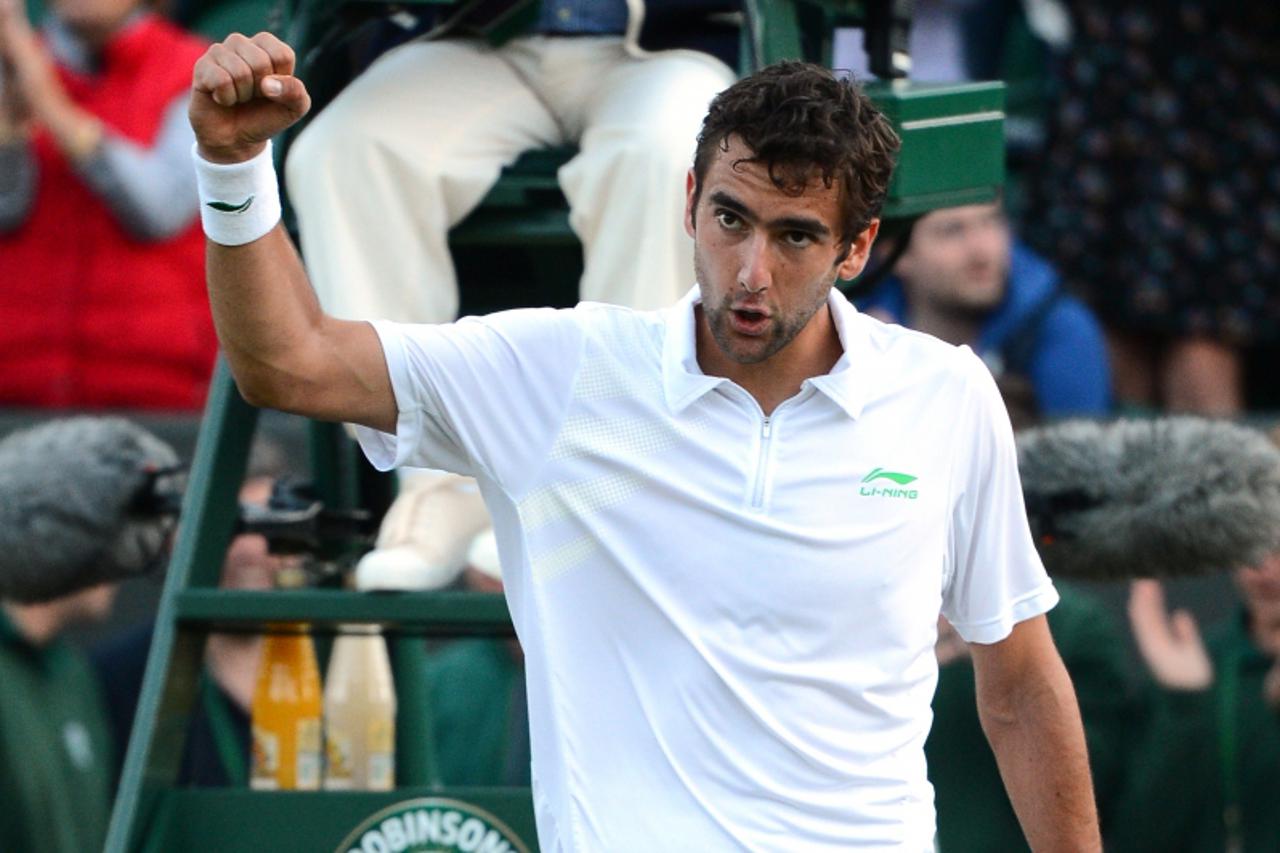 'Croatia\'s Marin Cilic celebrates his third round men\'s singles victory over US player Sam Querrey on day six of the 2012 Wimbledon Championships tennis tournament at the All England Tennis Club in 
