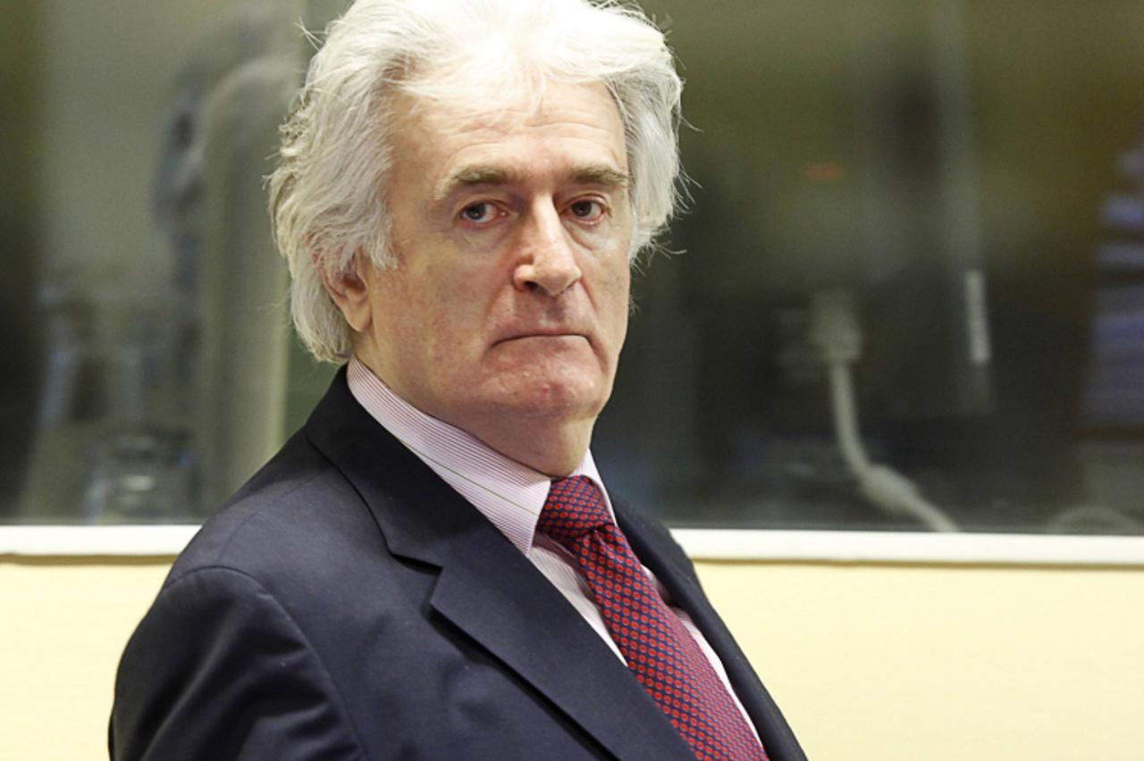 'Former Bosnian Serb leader Radovan Karadzic appears in the courtroom of the ICTY War Crimes tribunal in The Hague November 3, 2009. Karadzic appeared on Tuesday for an administrative hearing in his w