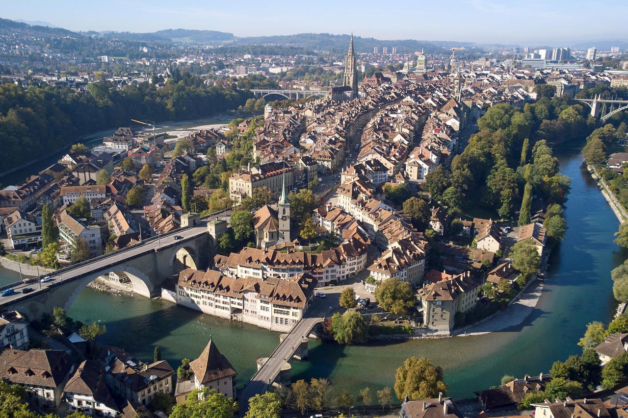 FILE PHOTO: The old town of Bern and the Aare river are pictured in early autumn light in Bern