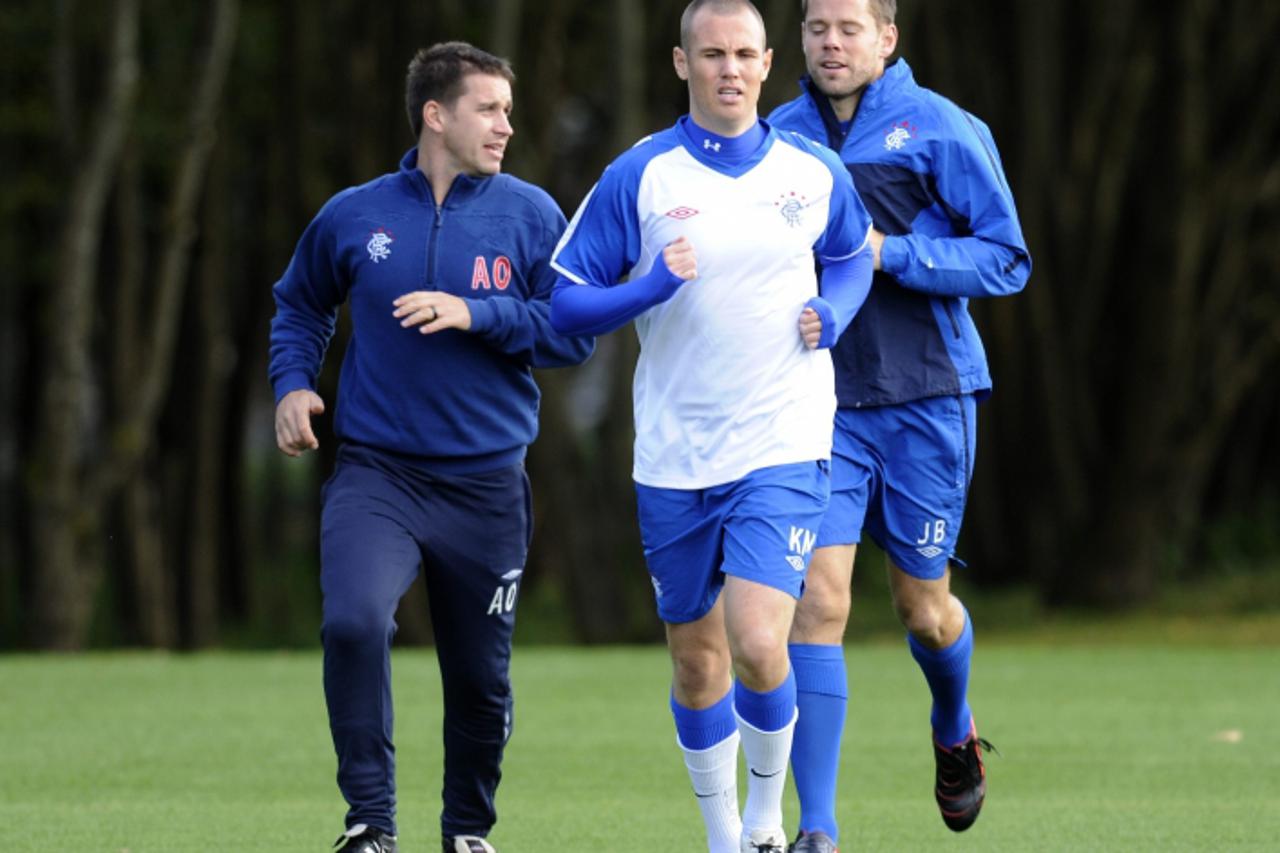 'Kenny Miller runs round the pitch at Murray Park during Rangers\' training session prior to their Champions League encounter with Valencia tomorrow evening at Ibrox Stadium, Glasgow, Scotland, Octobe