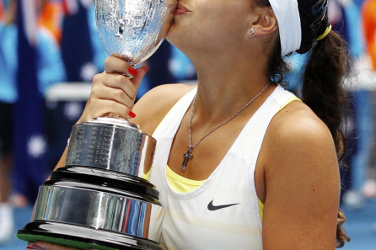 'Ana Konjuh of Croatia poses with the trophy after winning the junior girls' singles final match against Katerina Siniakova of Czech Republic at the Australian Open tennis tournament in Melbourne Jan