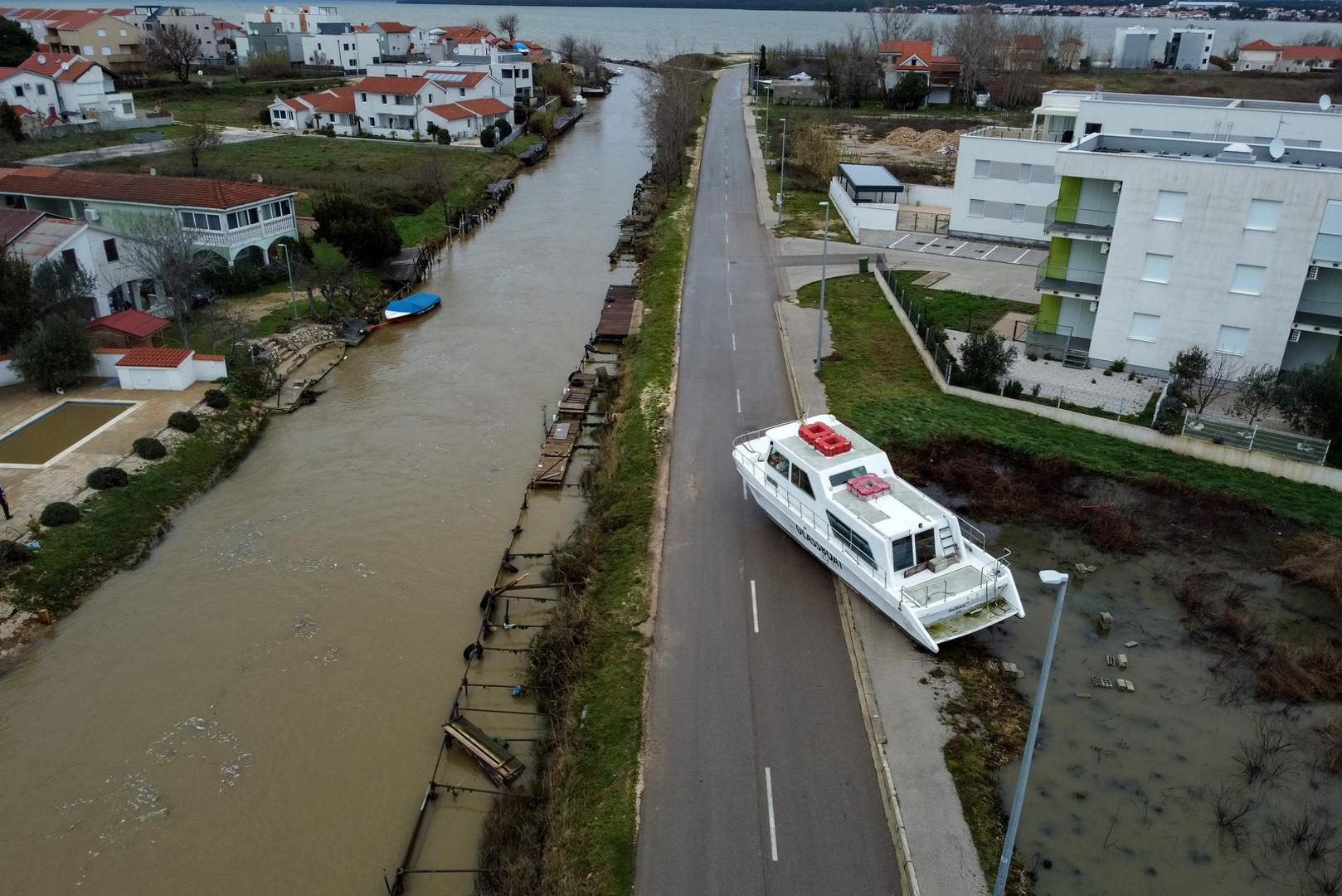 11.03.2024., Nin - Pogled iz zraka na posljedice jake kise koja je pala poplava je izbacila brod na cestu.  Photo: Sime Zelic/PIXSELL