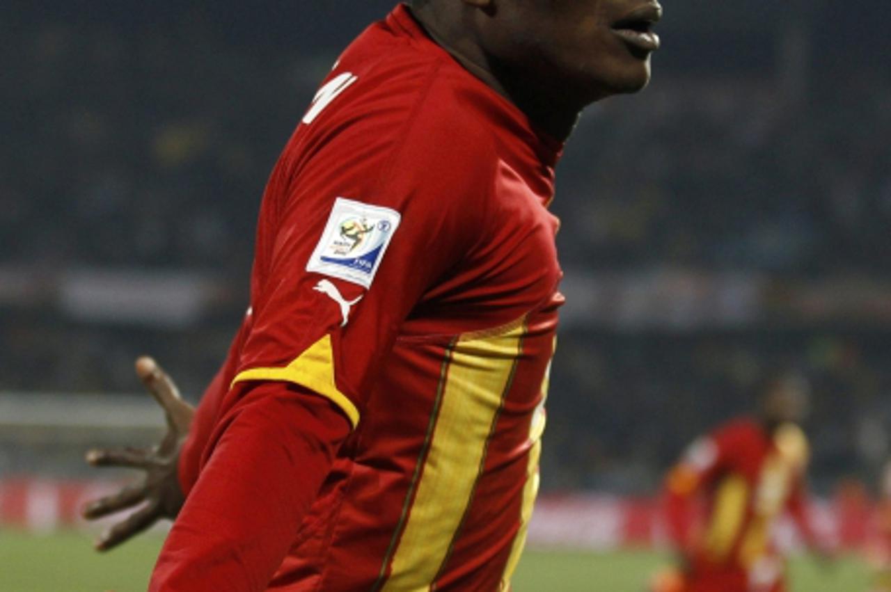 'Ghana's Asamoah Gyan celebrates scoring the second goal against the United States during their 2010 World Cup second round match at Royal Bafokeng stadium in Rustenburg June 26, 2010.     REUTERS/Br