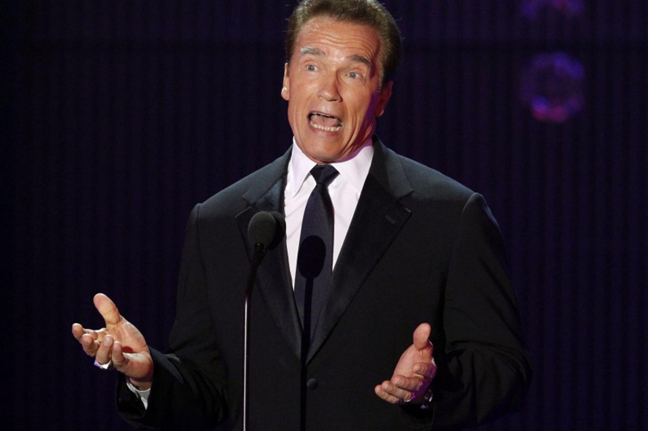 \'Former California governor Arnold Schwarzenegger speaks at the 16th Annual Critics\' Choice Movie Awards in Hollywood, California January 14, 2011.   REUTERS/Mario Anzuoni (UNITED STATES - Tags: ENT