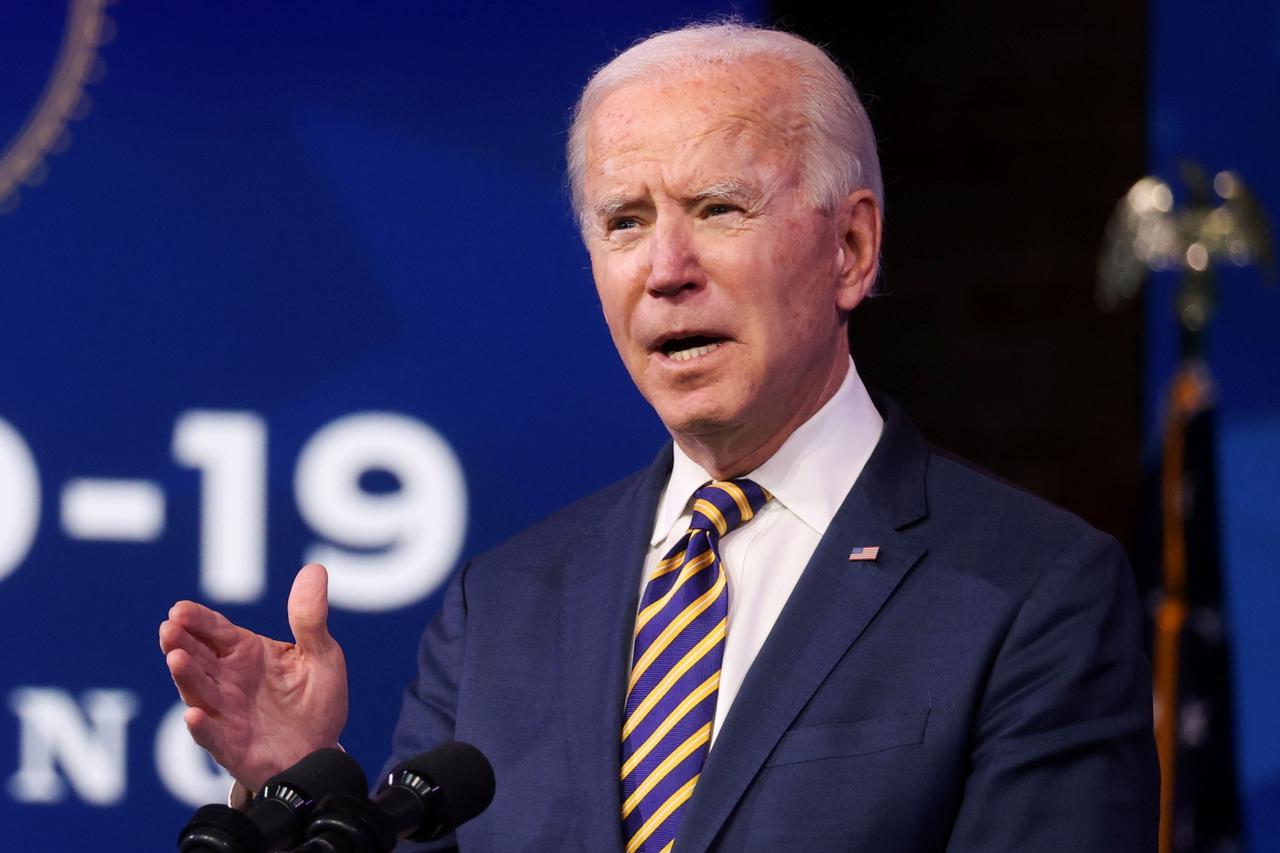 FILE PHOTO: U.S. President-elect Joe Biden delivers remarks on the U.S. response to the coronavirus disease (COVID-19) outbreak, at his transition headquarters in Wilmington