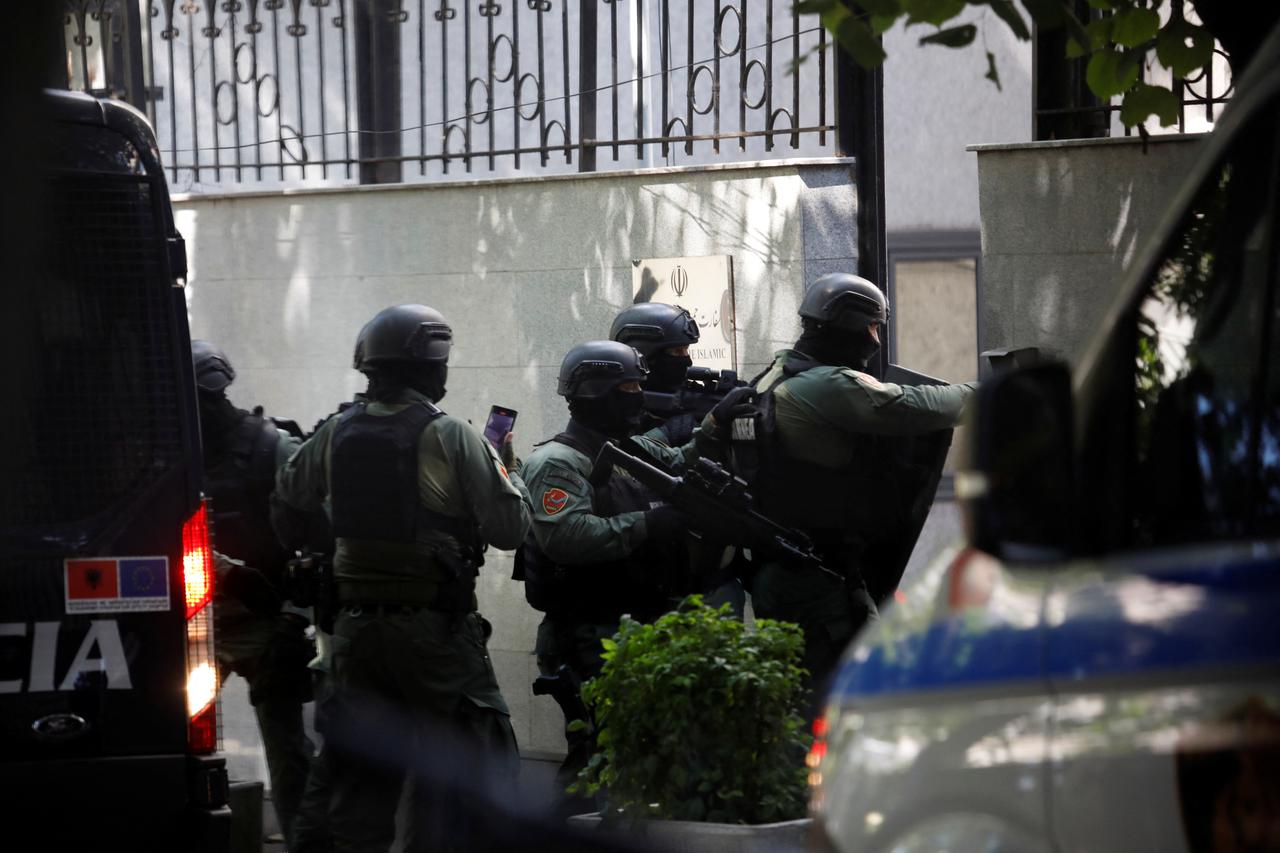 Members of the police special unit enter the Embassy of the Islamic Republic of Iran, in Tirana