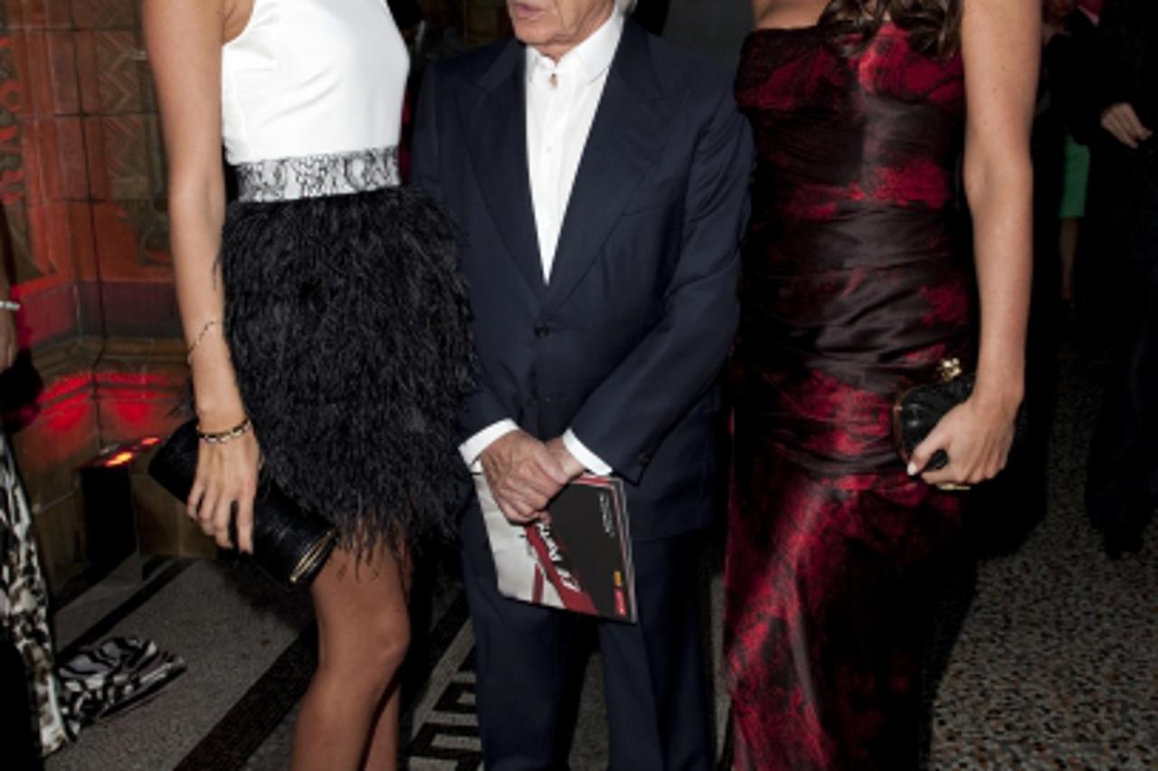 'Petra Ecclestone, Bernie Ecclestone and Tamara Ecclestone at the F1 party in aid of Great Ormond Street Hospital, at the Natural History Museum in west London. Photo: Press Association/Pixsell'