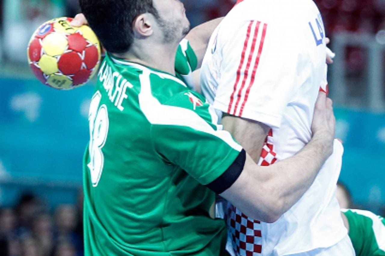 'Algeria's Hichem Kaabache (l) and Croatia's Blazenko Lackovic during 23rd Men's Handball World Championship preliminary round match.January 14,2013. Foto © nph / Acero) *** Local Caption ***'