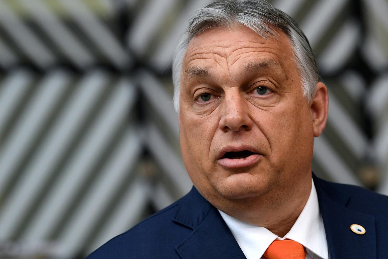 FILE PHOTO: Hungary's Prime Minister Viktor Orban addresses the media as he arrives on the first day of the European Union summit at The European Council Building in Brussels, Belgium June 24, 2021.