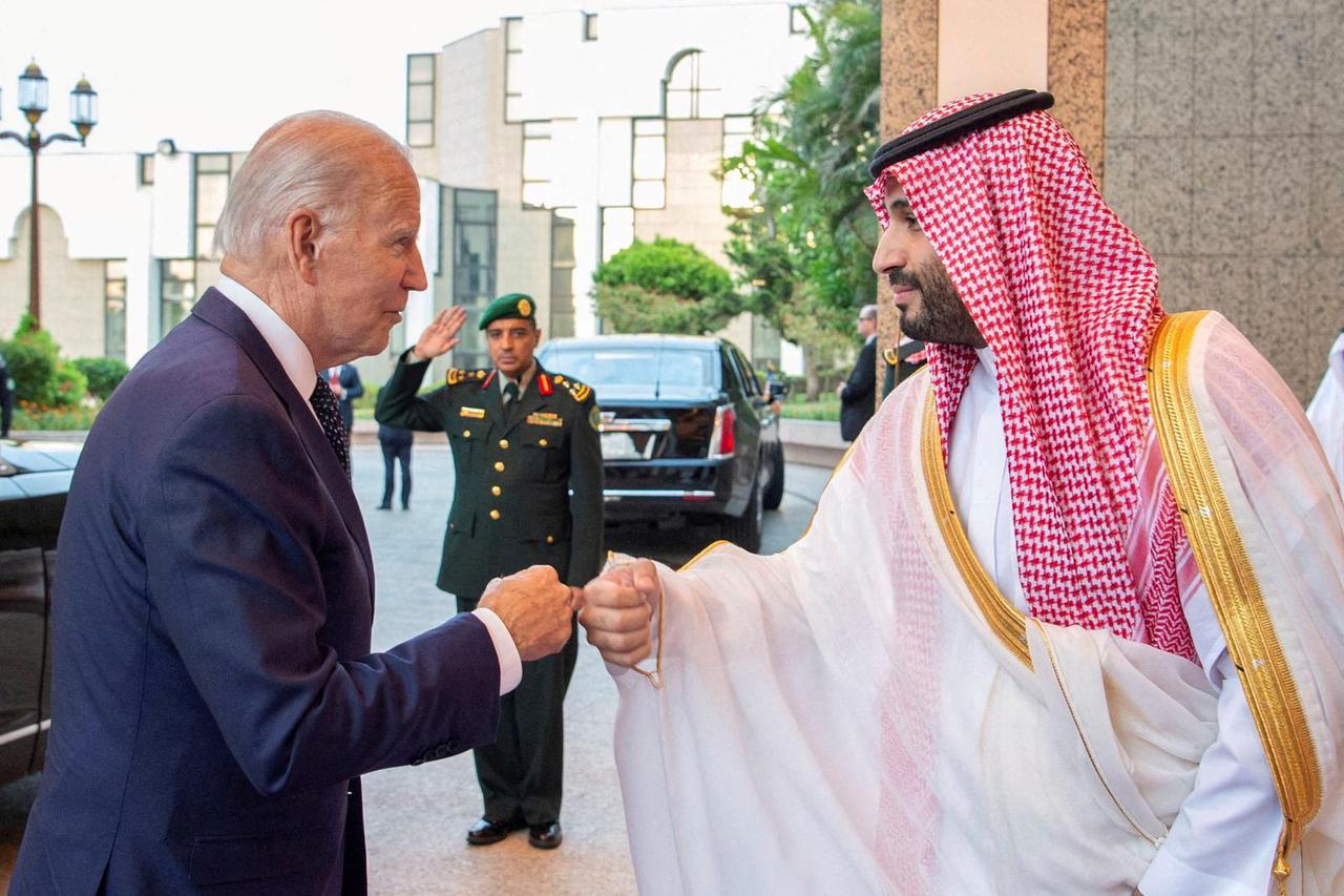 FILE PHOTO: Saudi Crown Prince Mohammed bin Salman fist bumps U.S. President Joe Biden upon his arrival at Al Salman Palace, in Jeddah