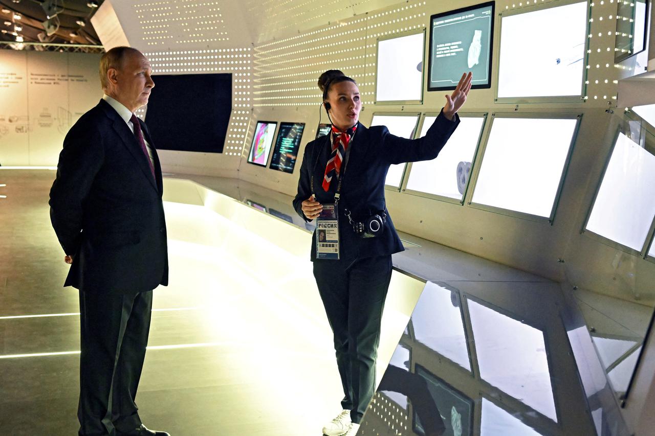 Russian President Putin visits an exhibition in Moscow