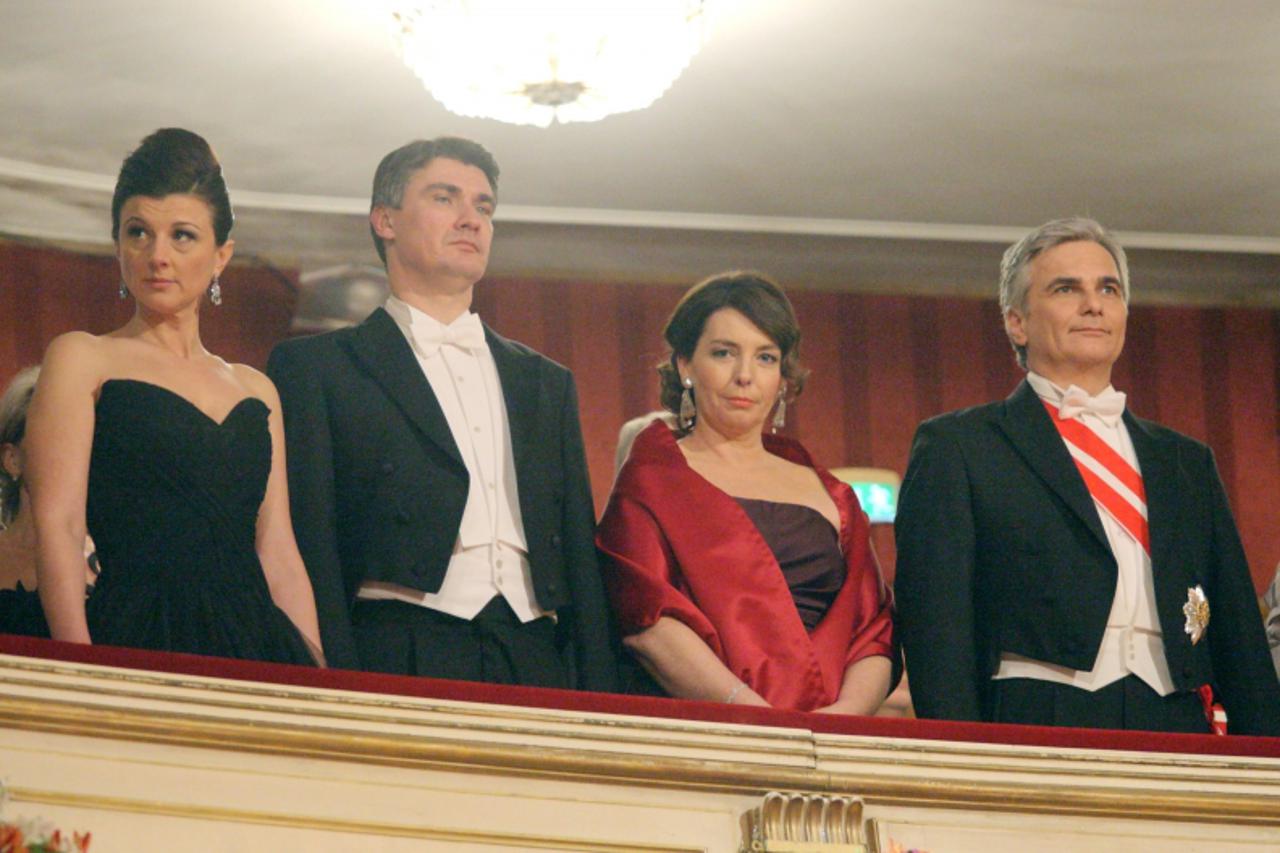 'Austrian Chancellor Werner Faymann (R) and his wife is pictured with Croatia\'s Prime minister Zoran Milanovic (2L) and his wife Sanja Music stand at the traditional Opera Ball on February 16, 2012 i