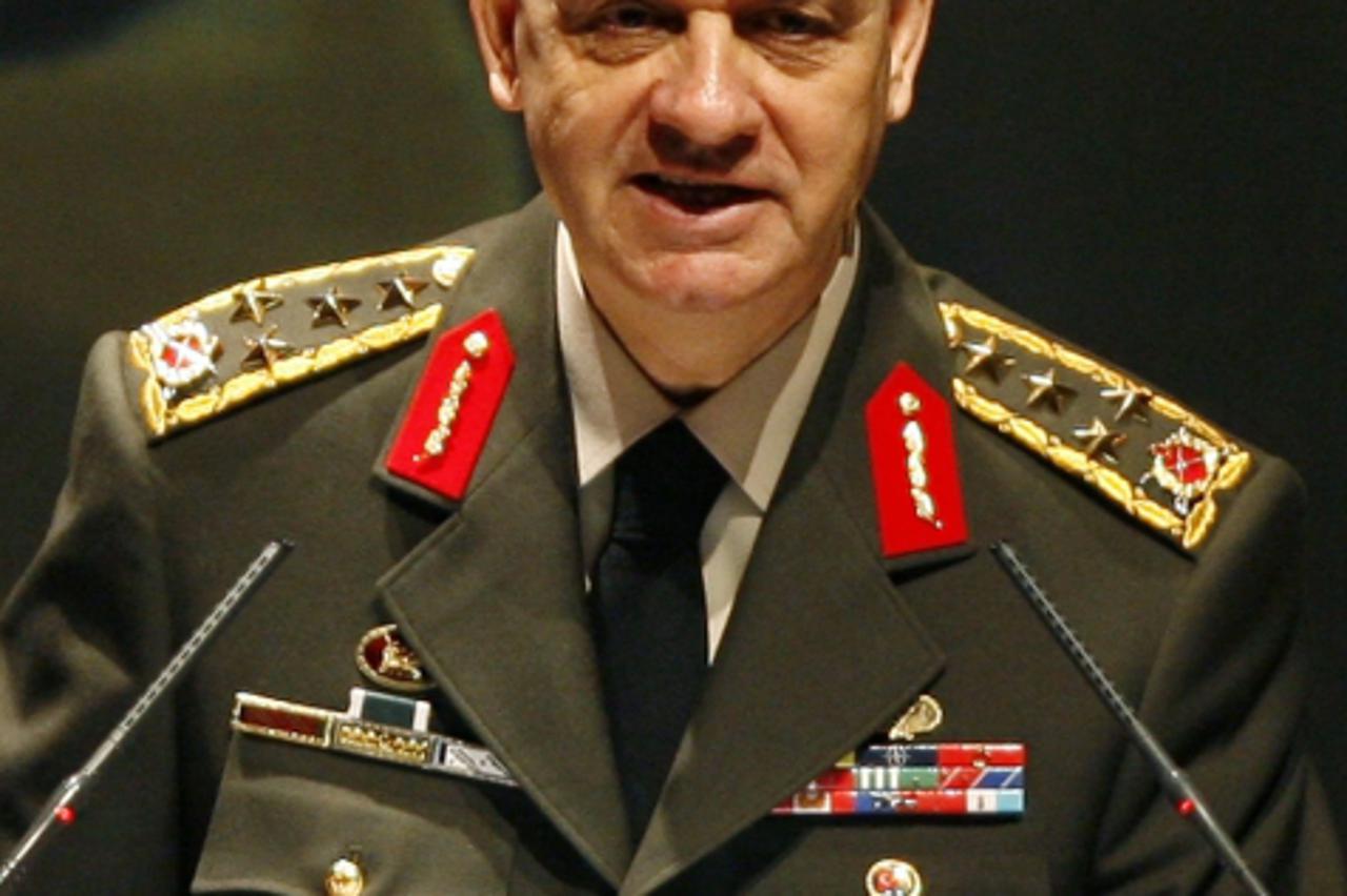 'General Ilker Basbug addresses the war academy in Istanbul in this April 14, 2009 file photo. Former Turkish armed forces chief Basbug spent his first night behind bars on January 6, 2012, charged wi