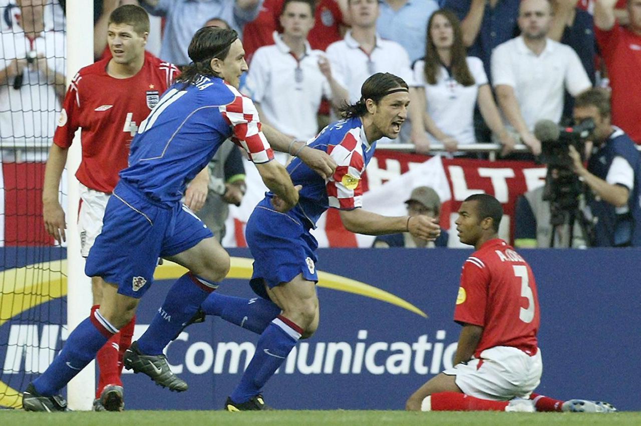 Croatia's Niko Kovac celebrates scoring the opening goal against England, with team-mate Tomo Sokota (left) during the Euro 2004, first round, group B match at the Estadio de Luz in Lisbon, Portugal.    EDITORIAL USE ONLY, NO MOBILE PHONE OR PDA USE. INTE