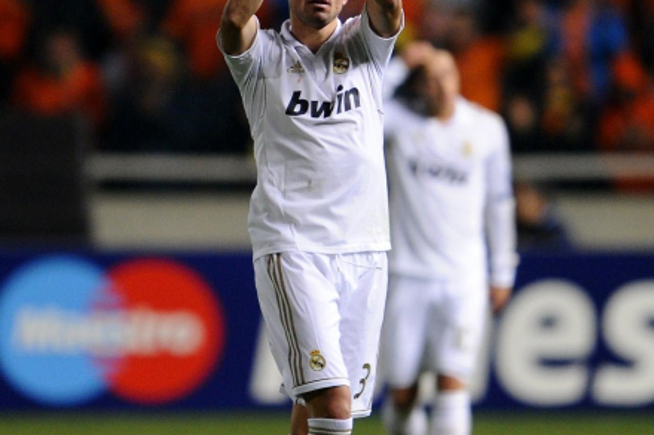 'Real Madrid\'s Portuguese defender Pepe celebrates after beating APOEL in their UEFA Champions League first leg quarter-final football match at GSP Stadium in Nicosia on March 27, 2012. Real Madrid w