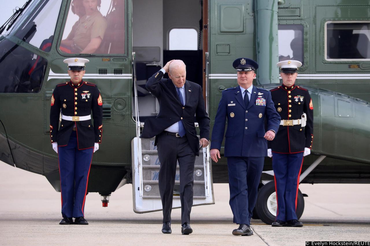U.S. President Biden boards Air Force One at Joint Base Andrews en route to Brussels